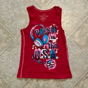 Red “Rockin’ in the USA” tank top with a USA & headphones design